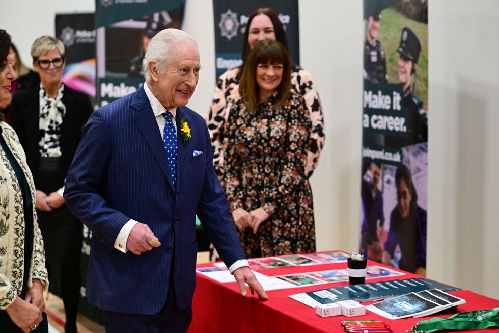 King Charles spotted with hand injury as he leaves England with Queen ...