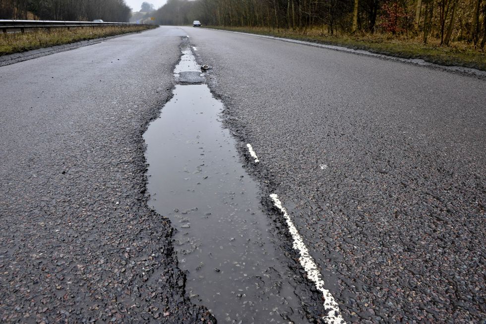 large pothole on road