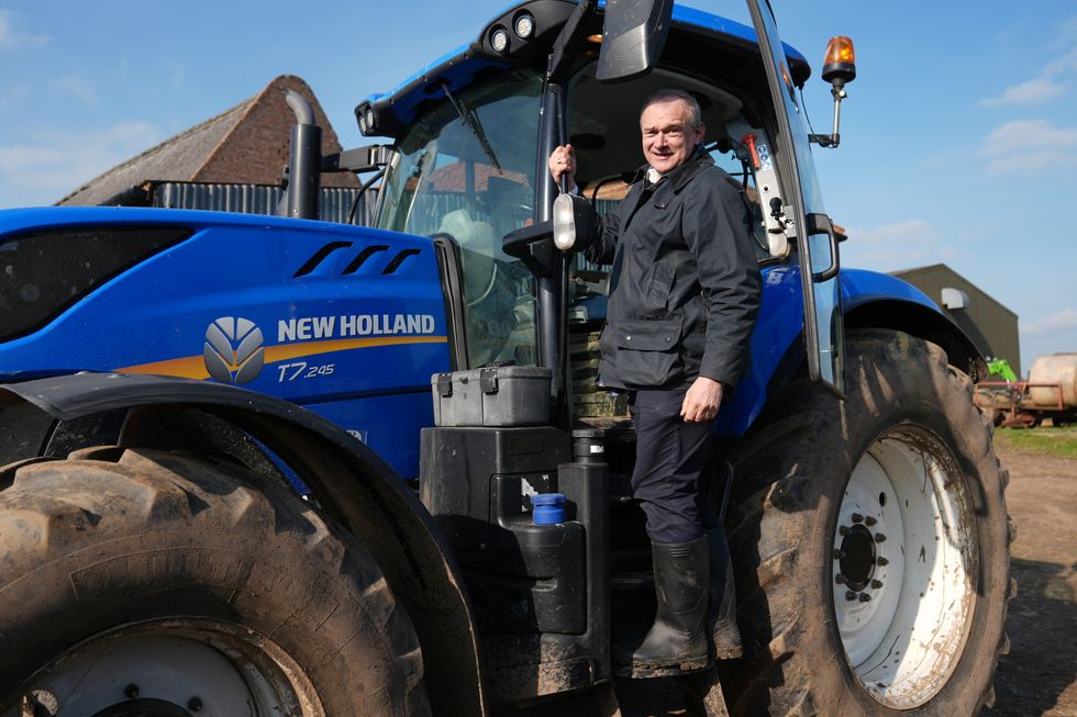 Liberal Democrats leader Sir Ed Davey after driving a tractor during a visit to White Lodge Farm, near North Walsham, Norfolk