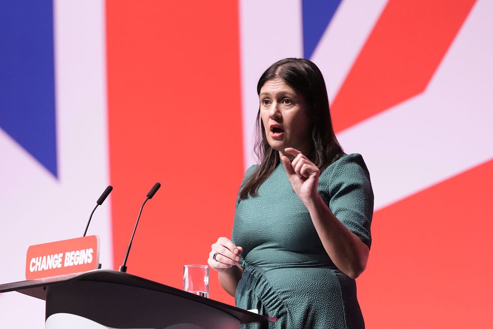 lisa nandy on-stage at Labour Party Conference with a union flag behind her