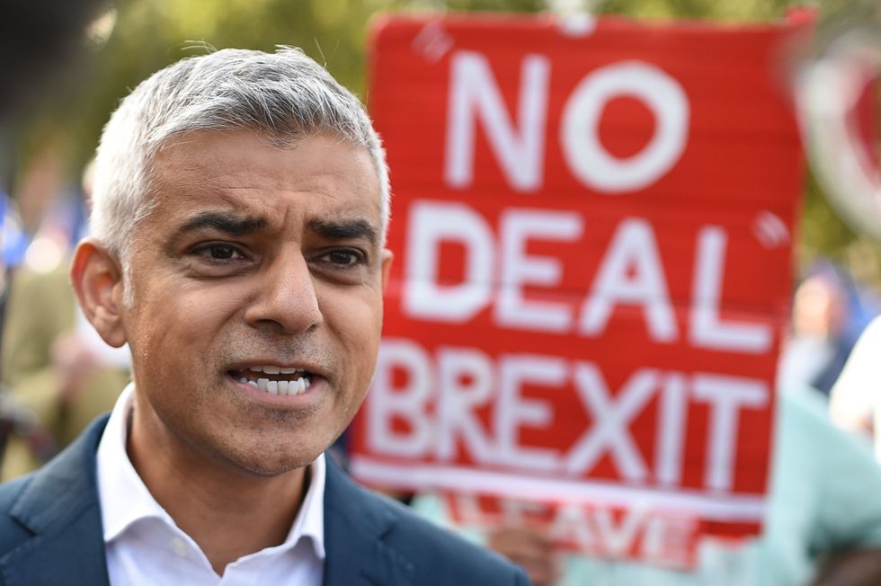 London Mayor Sadiq Khan speaks to the media as he arrives ahead of a cross-party rally organised by the People's Vote organisation campaigning for a second EU refrendum