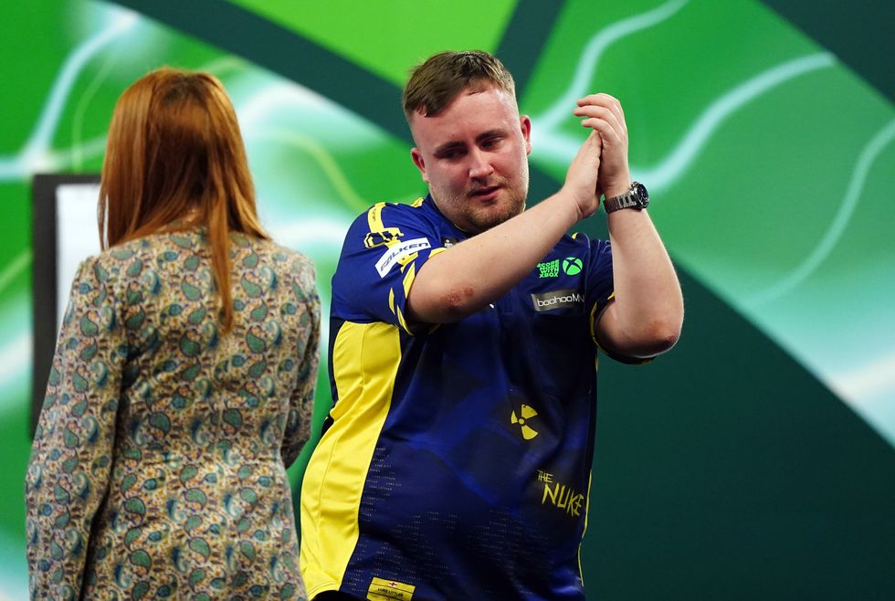 Luke Littler tears World Darts Championship