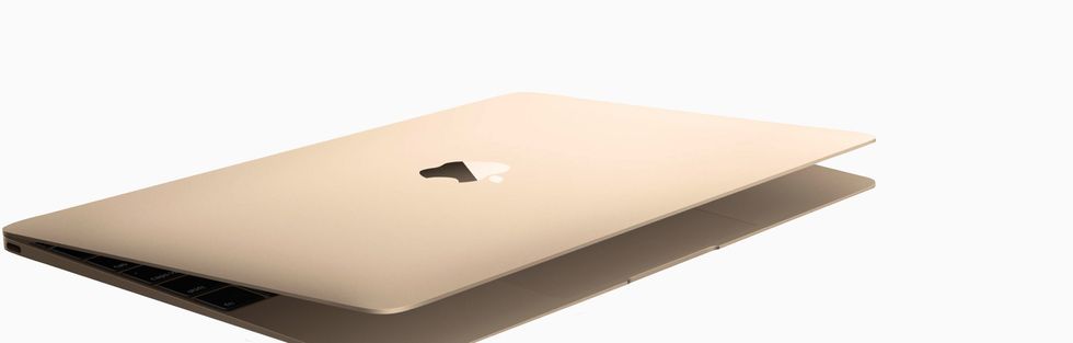 macbook air with its lid pictured half-open