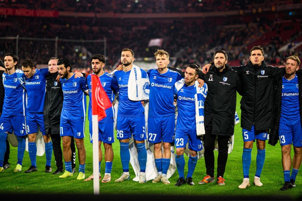 Magdeburg players stand together with their fans during the Second Bundesliga match\u200b