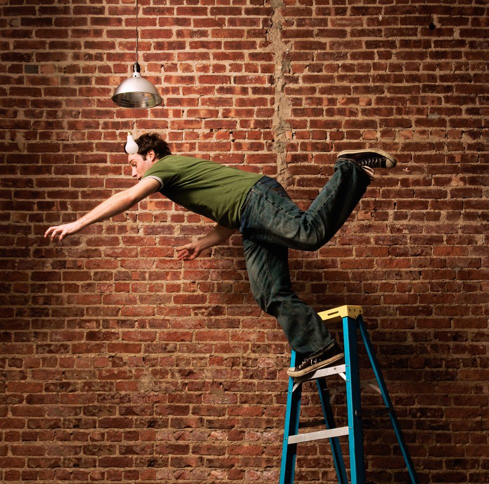 Man falling off ladder