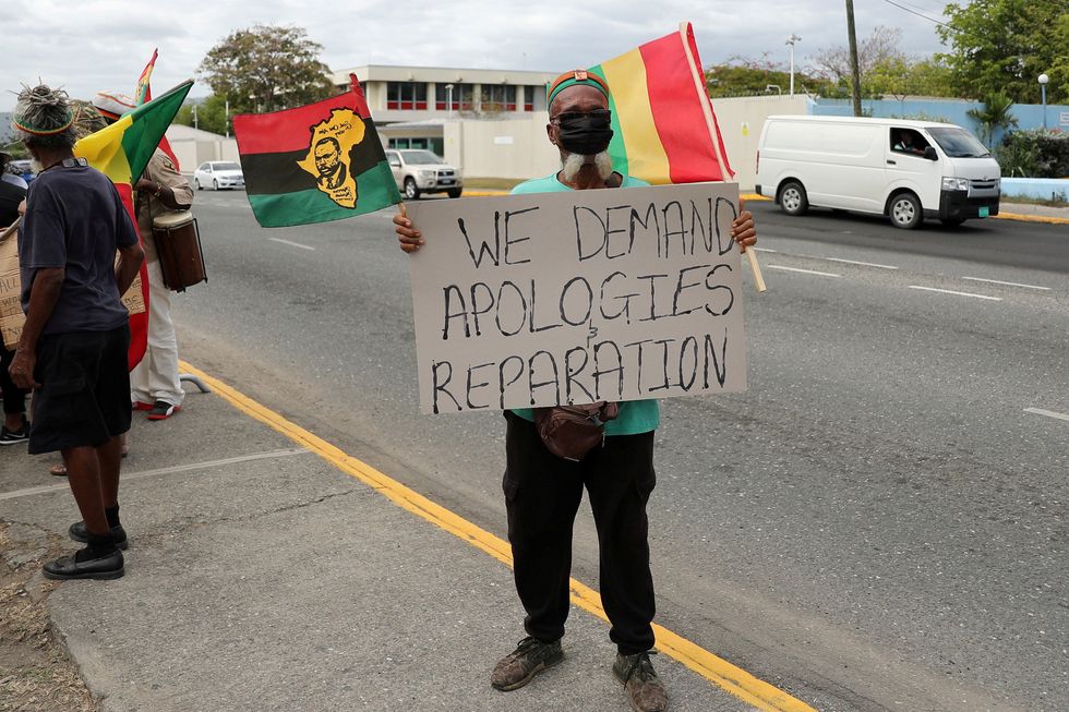 Man holding a sign