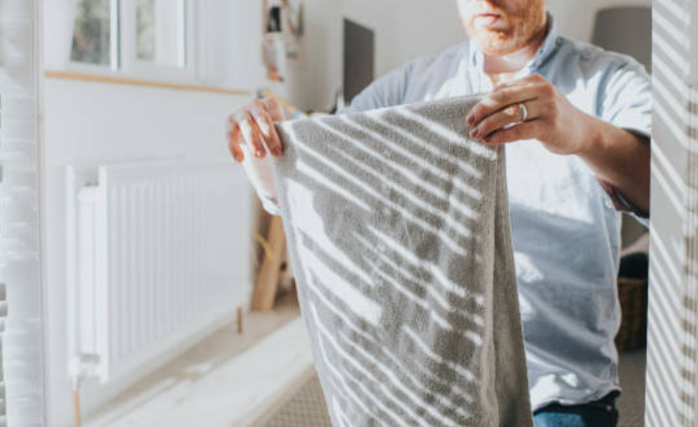 Man holding a towel