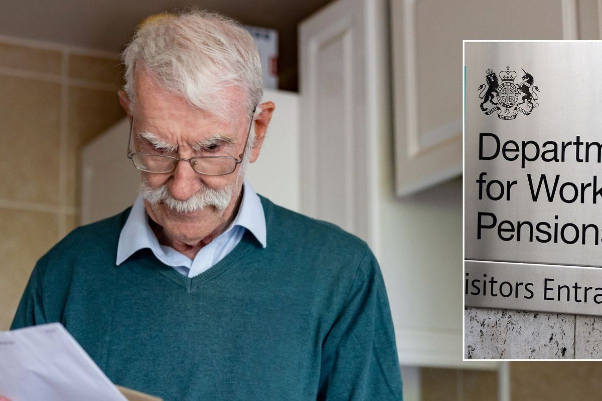 Man looking at letter and DWP sign 