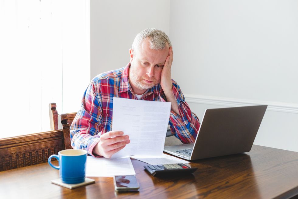 Man looking at paperwork