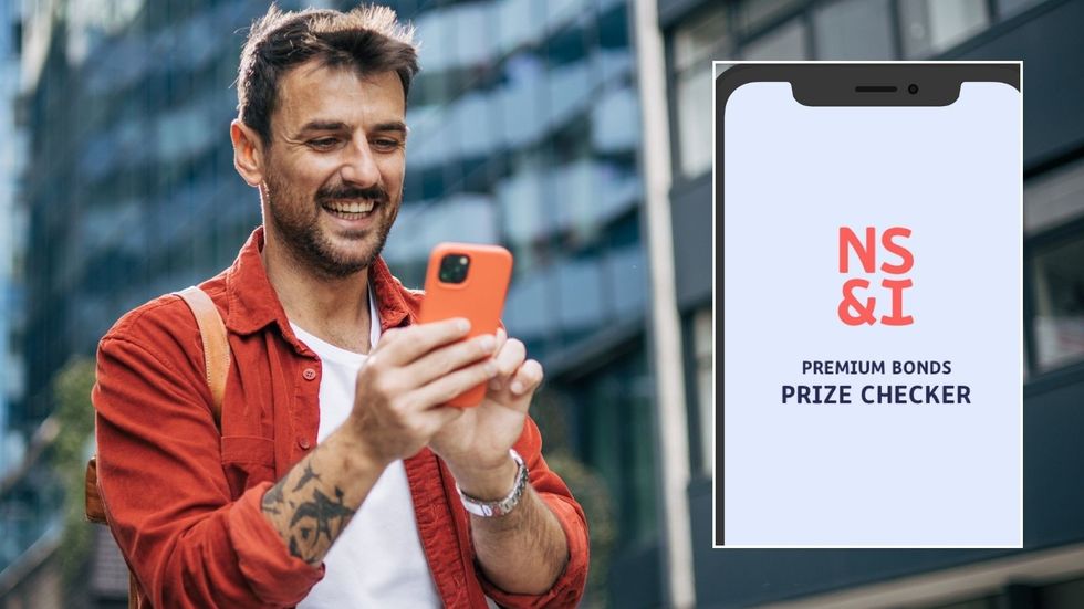 Man looking at phone and Premium Bonds prize checker 