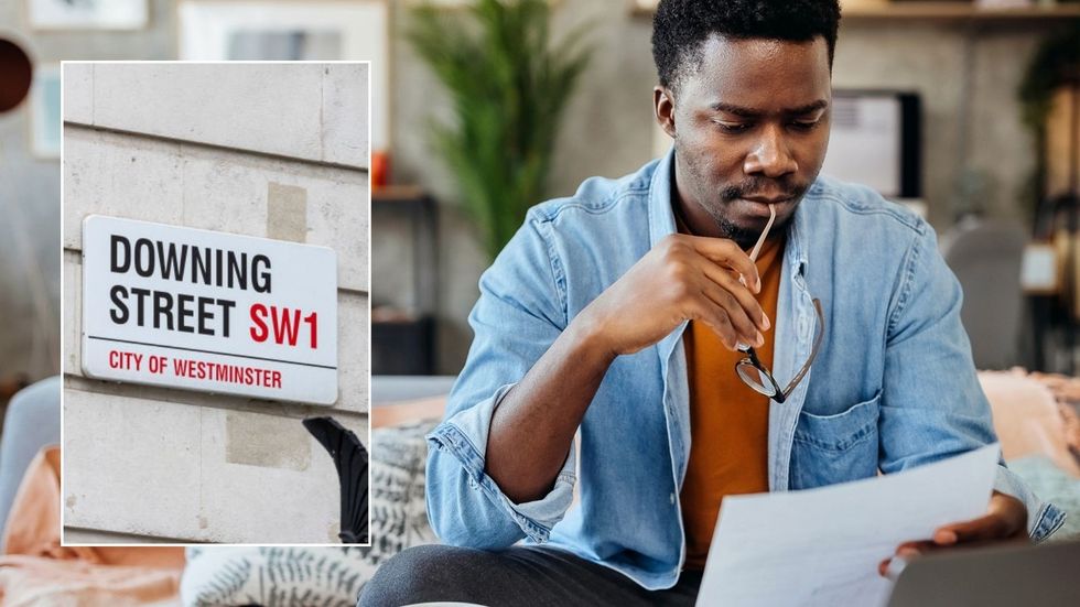 Man looking worried and Downing Streeet sign