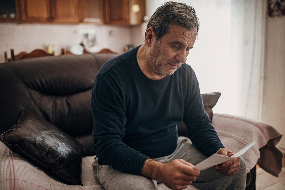 Man looks at documents