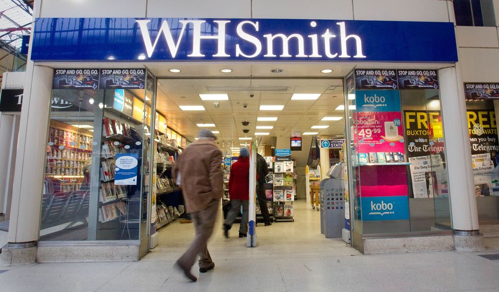 Man walking into WHSmith