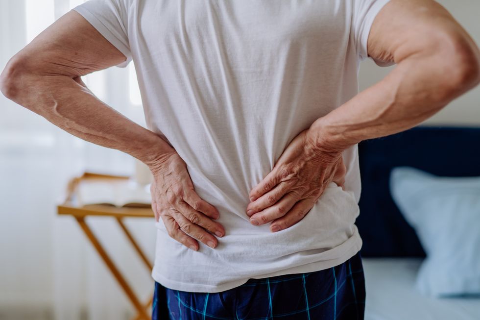 MAN WITH BACK PAIN