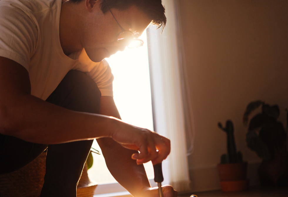 Man with screwdriver