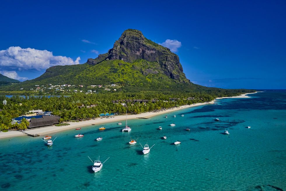 Mauritius island and boats on water