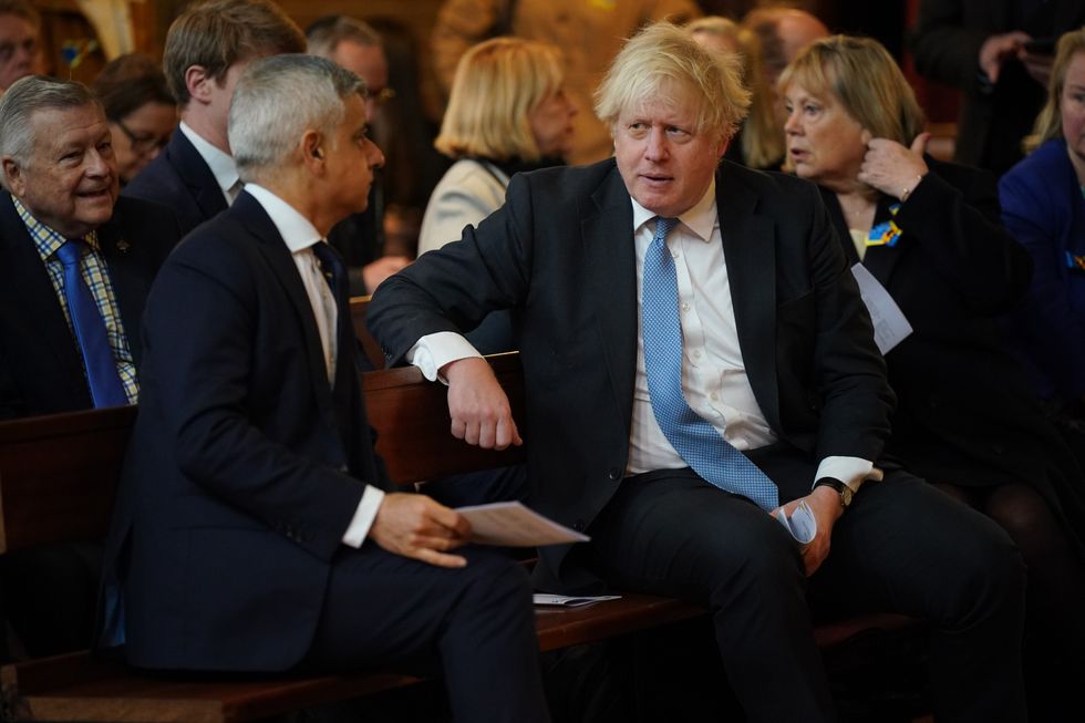 Mayor of London Sadiq Khan speaks with Boris Johnson at the Ukrainian Catholic Cathedral\u200b