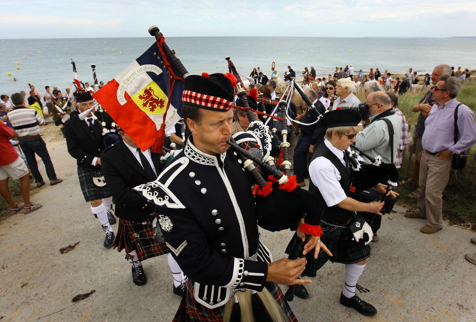 Memorial service on Sword Beach to Bill Millin after his death in 2010