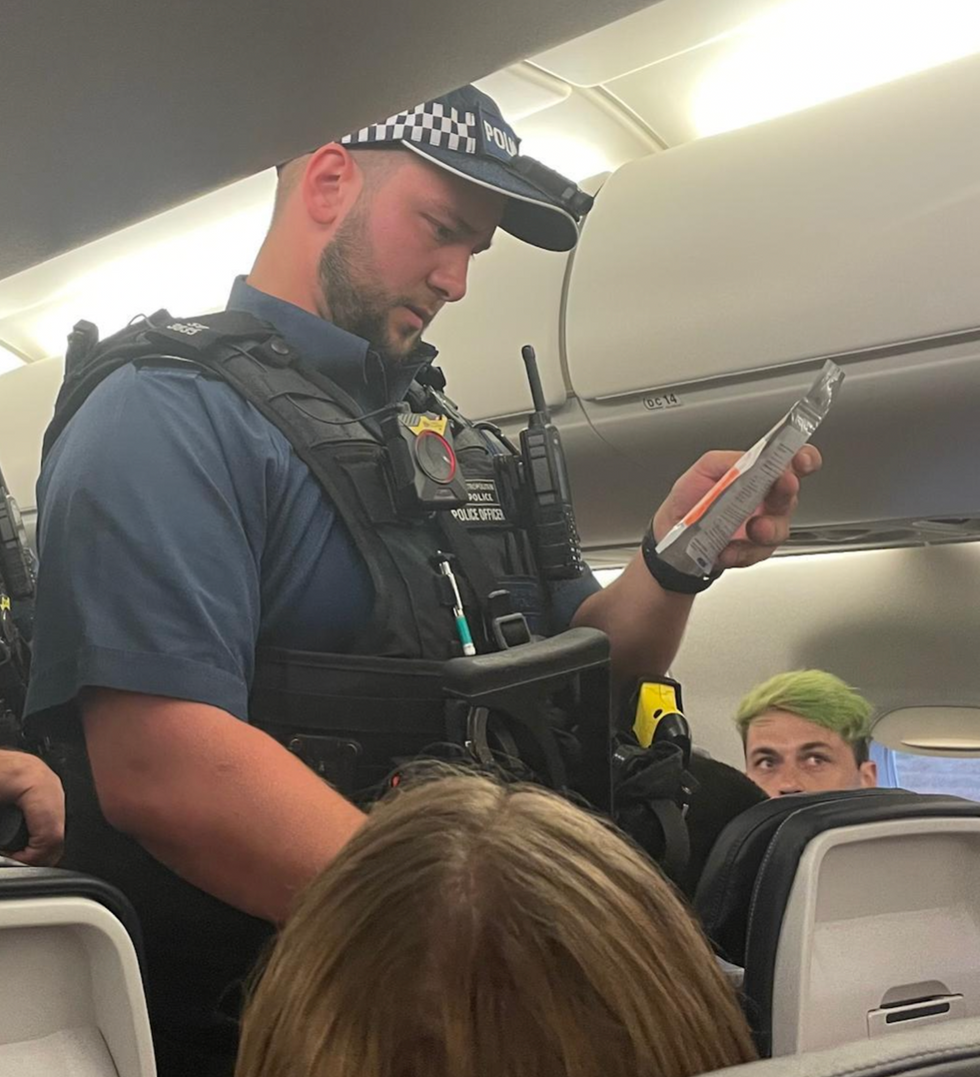 Met Police officer questions passenger