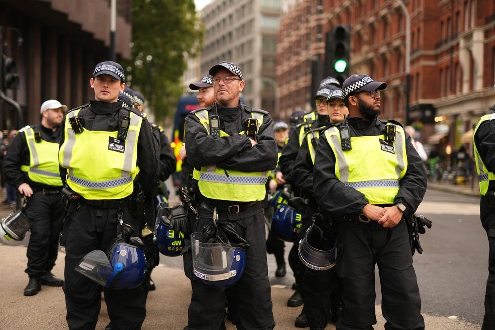 Metropolitan Police officers gather in Central London