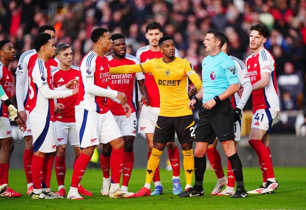 Michael Oliver showed Myles Lewis-Skelly a straight red