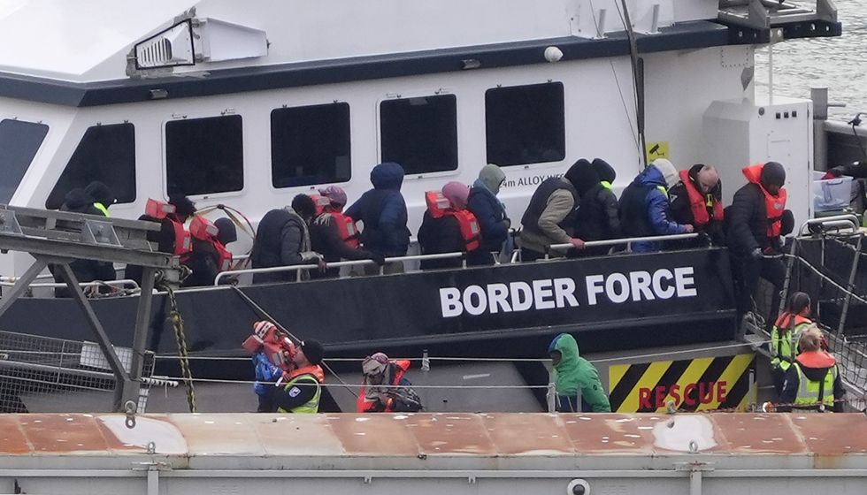 Migrants arrive in Britain on u200bBorder Force vessel