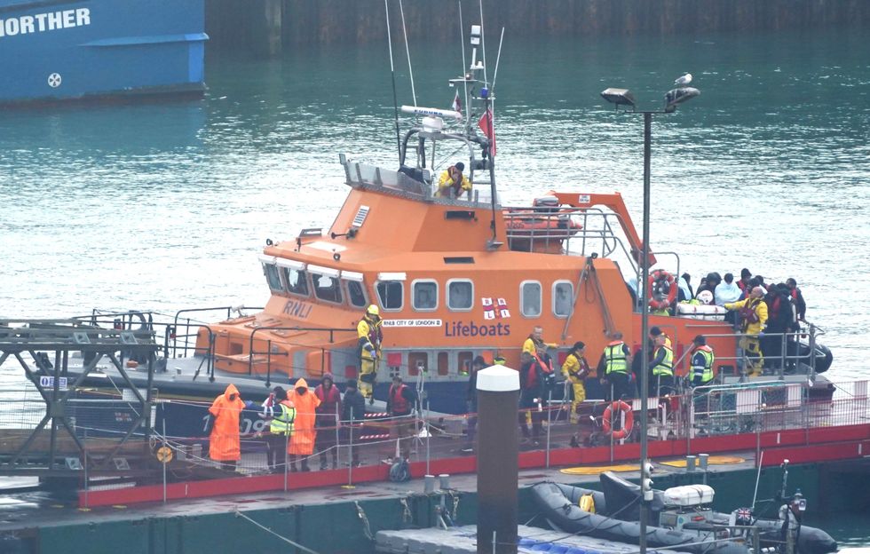 Migrants being brought to shore