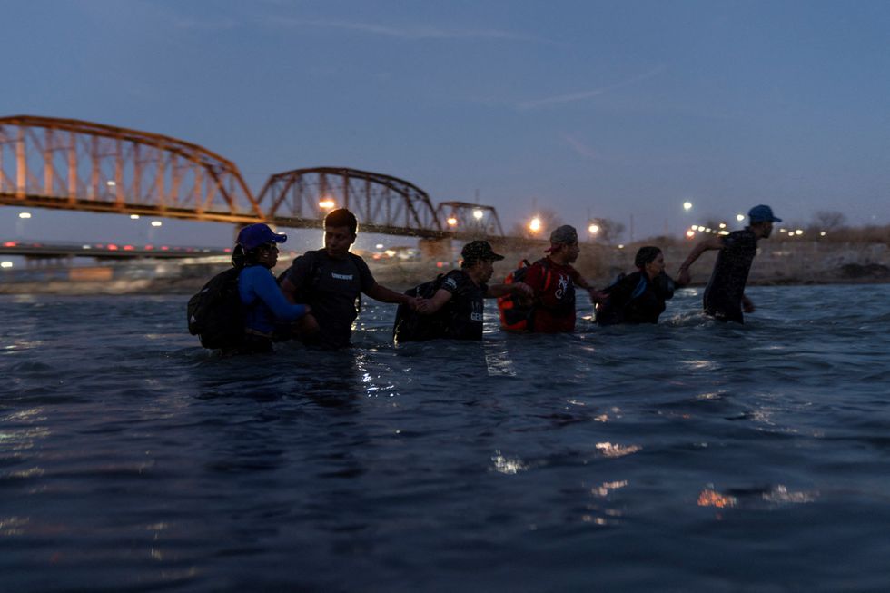 Migrants crossing the Rio Grande