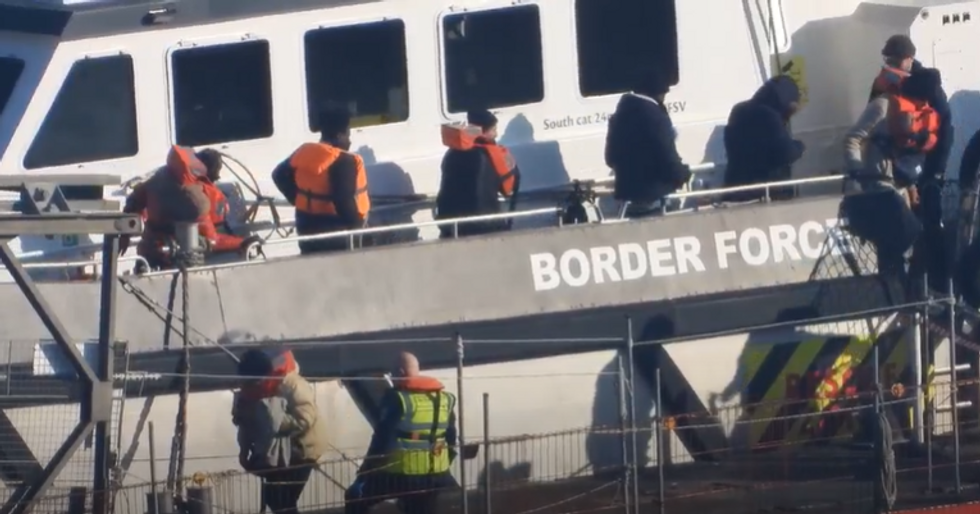 Migrants on border force boat