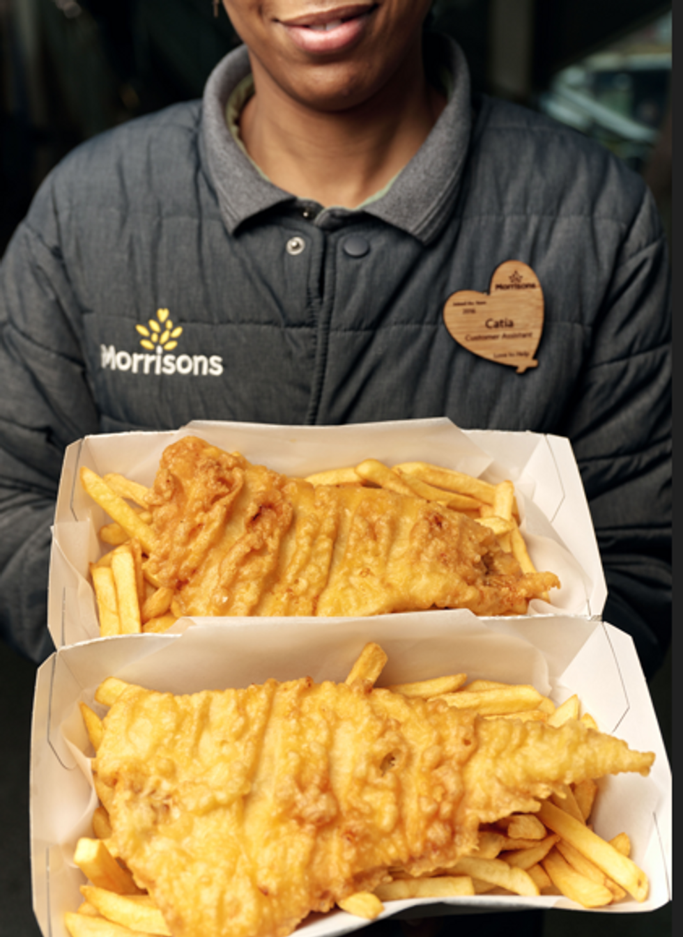 Morrisons colleague holding fish and chips