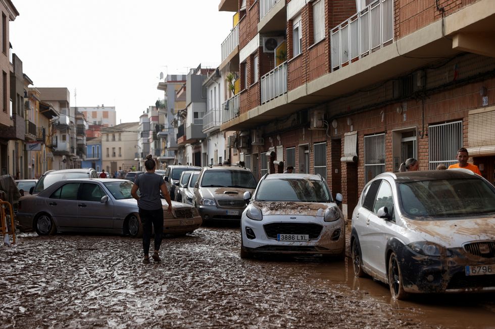 Mud on street in Spain following floods in Spain