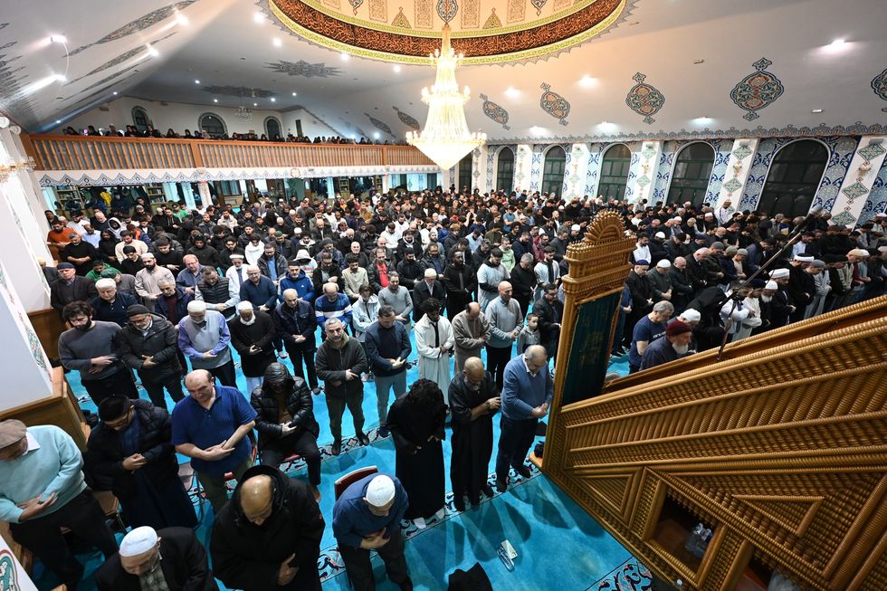 Muslims perform the first tarawih prayer of the holy month of the Ramadan at the Aziziye Mosque in London