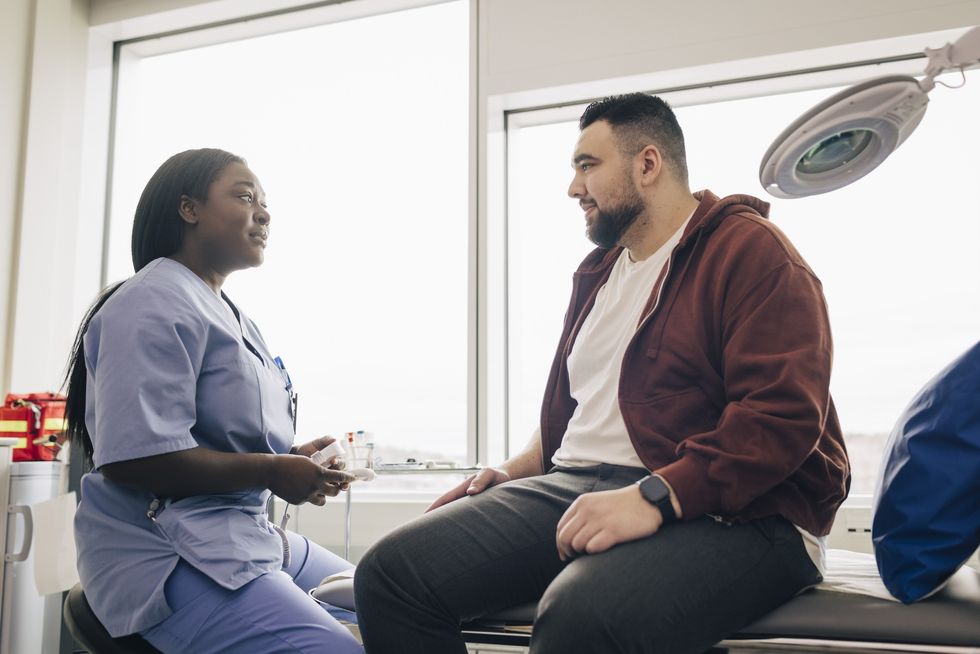 NHS nurse and patient