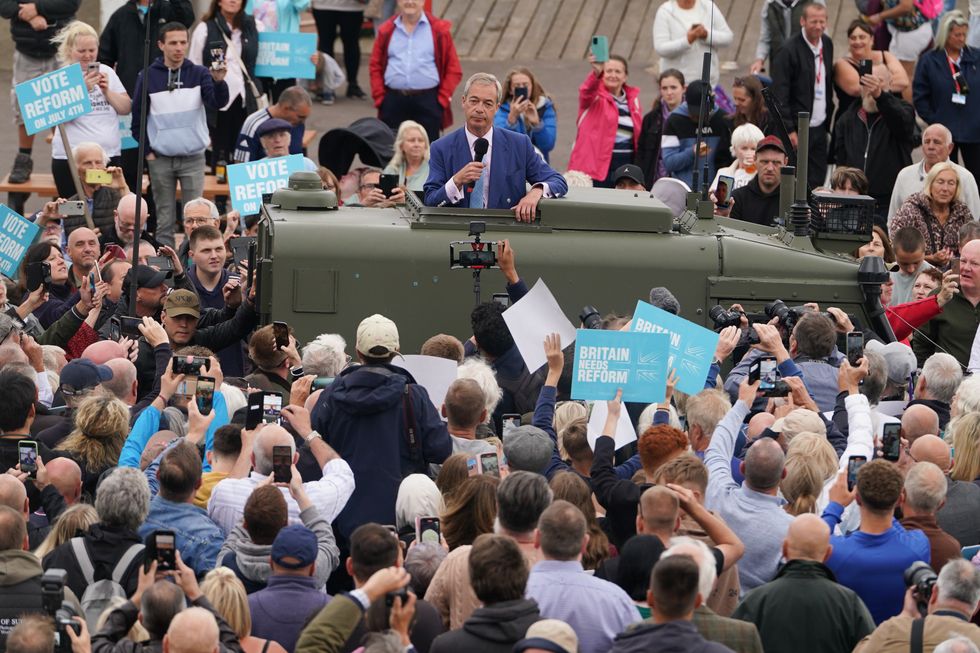 Nigel Farage surrounded by supporters whilst on the campaign trail in Clacton