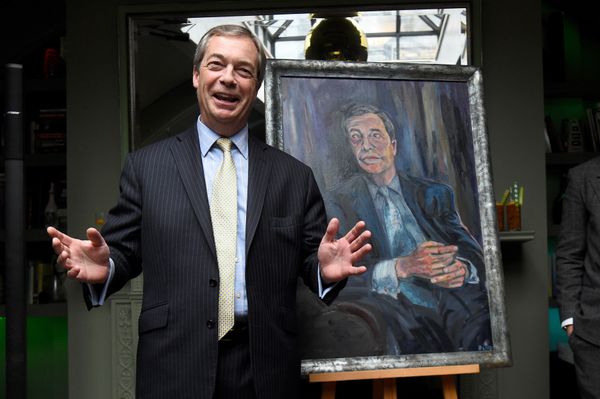 Nigel Farage with his portrait by Dan Llywelyn Hall