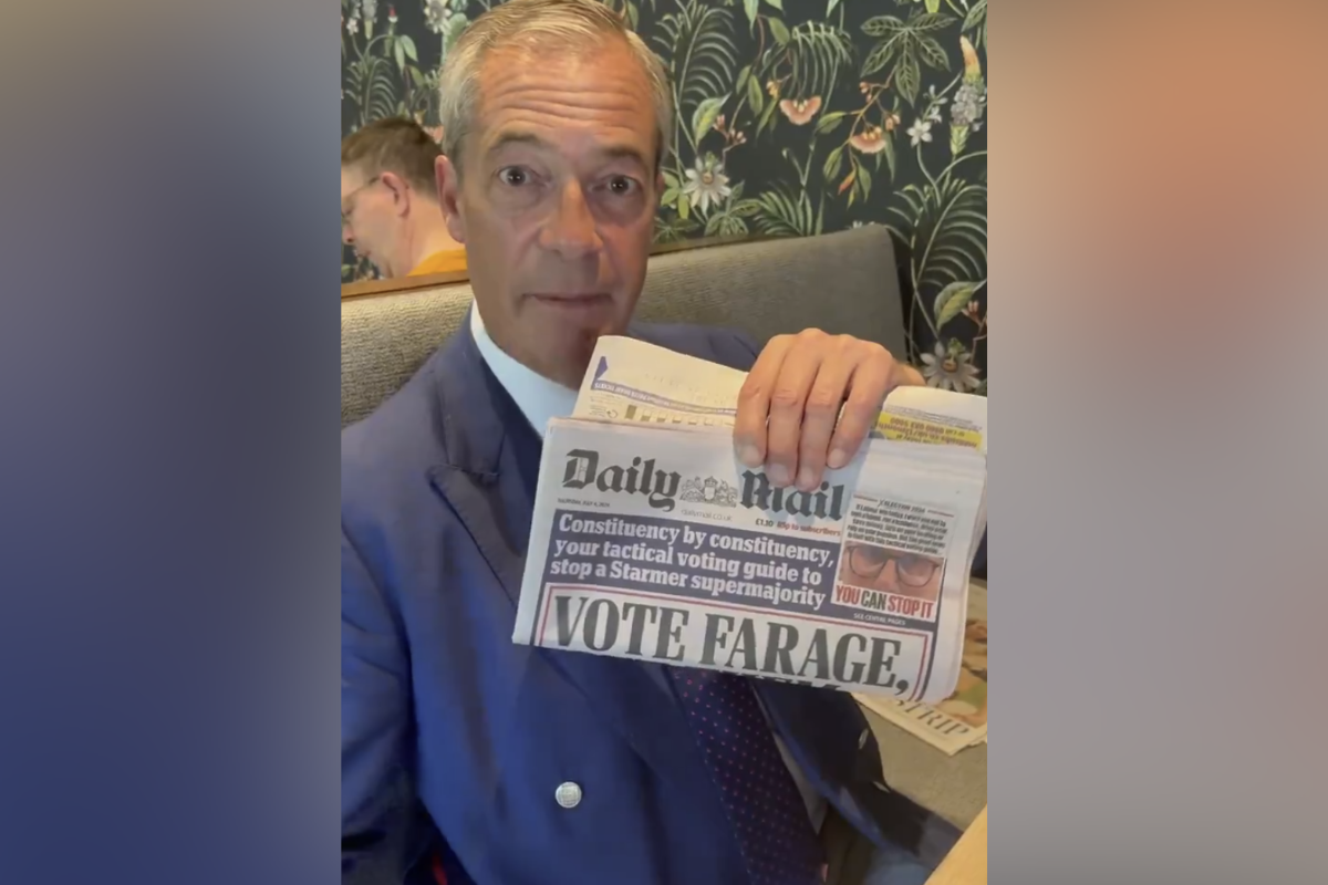 Nigel held up a copy of today's paper​