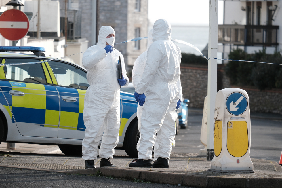 Officers at the scene of the crime in Plymouth