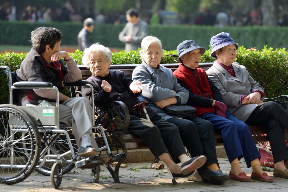 Old lades sitting on a bench