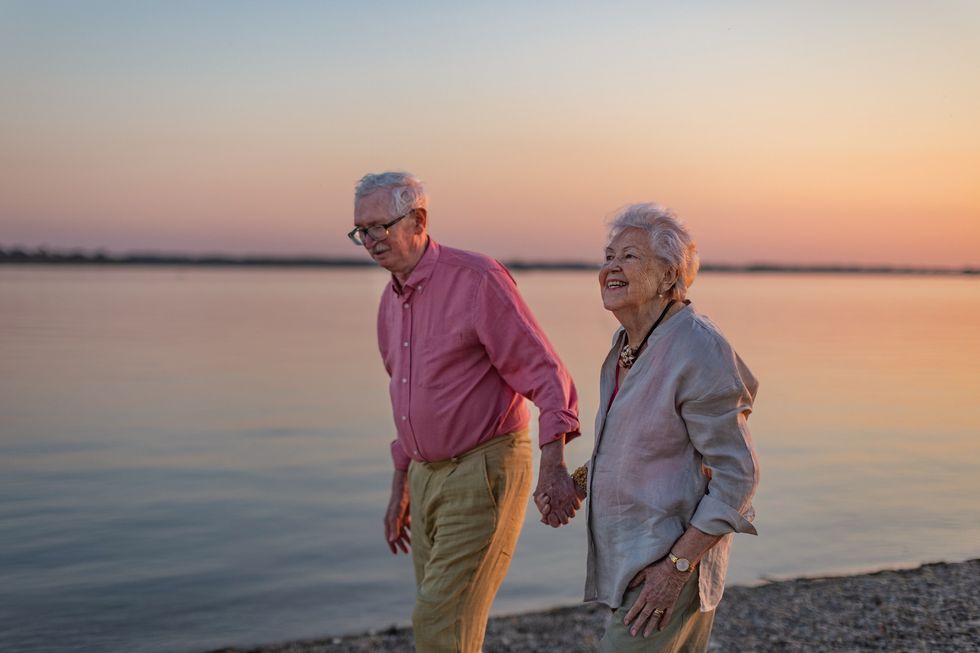 Older couple on the beach on holiday