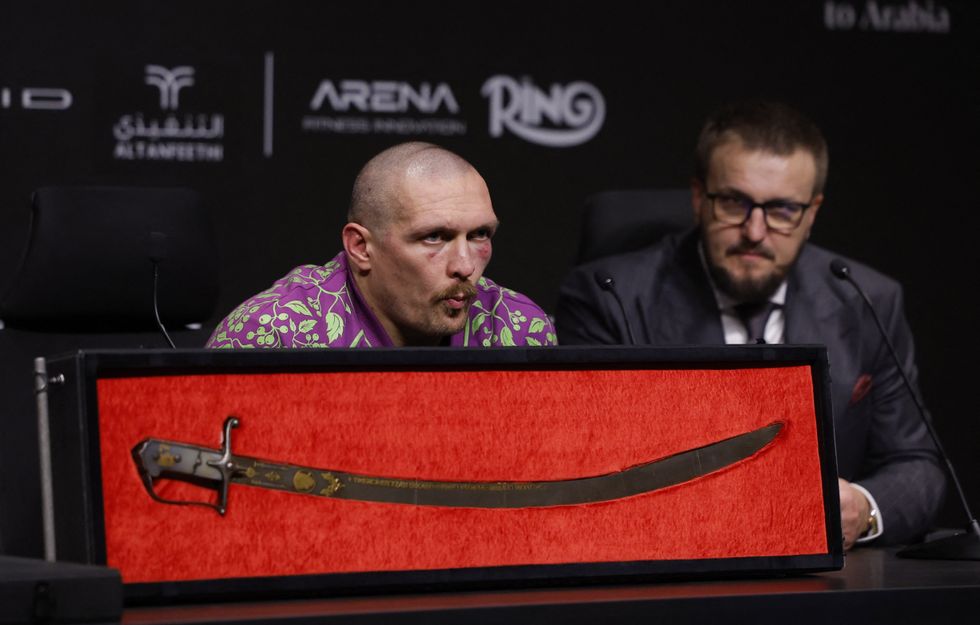 Oleksandr Usyk during a press conference after winning his fight against Tyson Fury