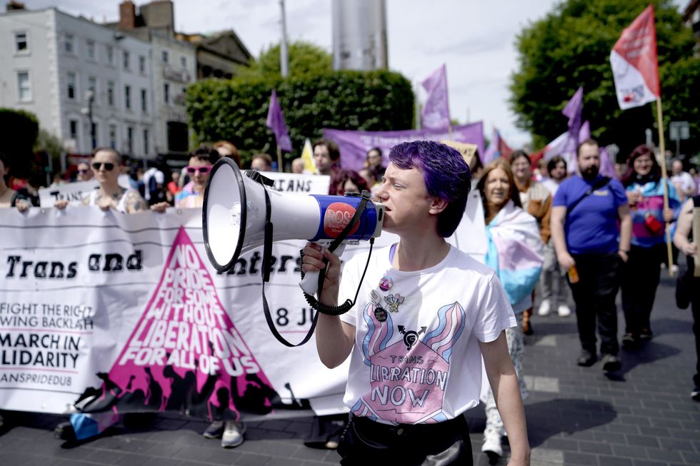 Ollie Bell (centre) takes part in the Trans and Intersex Pride Dublin March in Dublin, Republic of Ireland. Picture date: Saturday July 8, 2023.