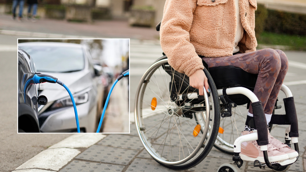 On-street electric charger and person in wheelchair on pavement