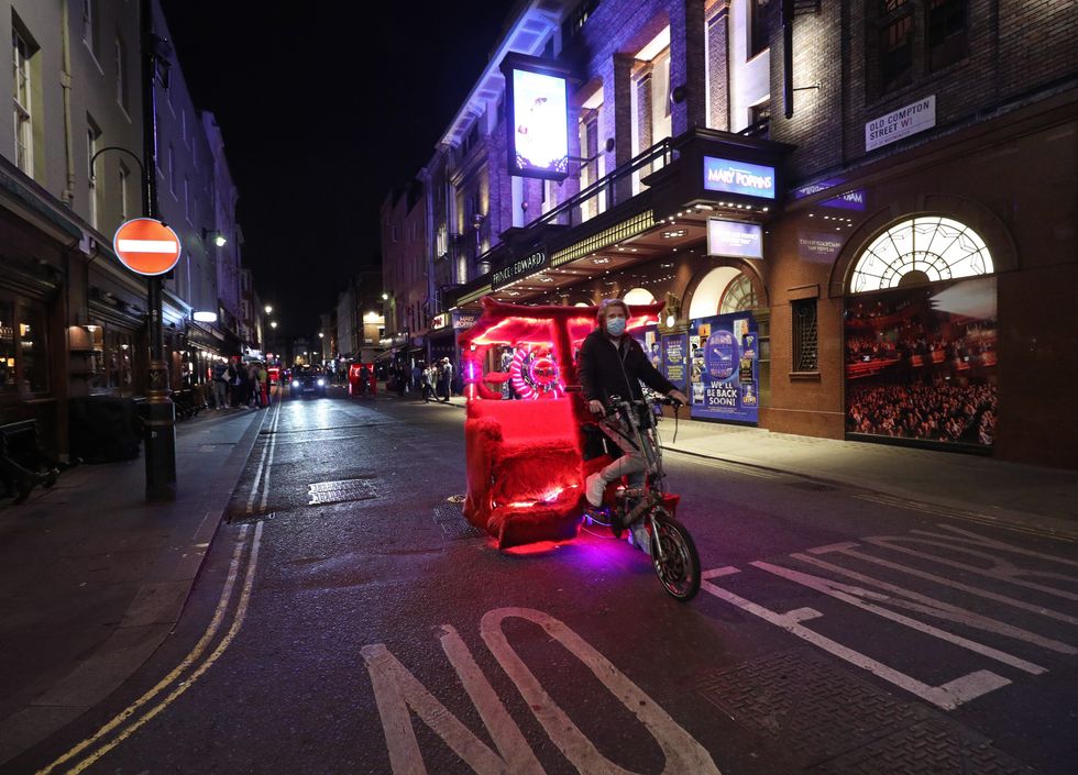 Pedicab driving through London