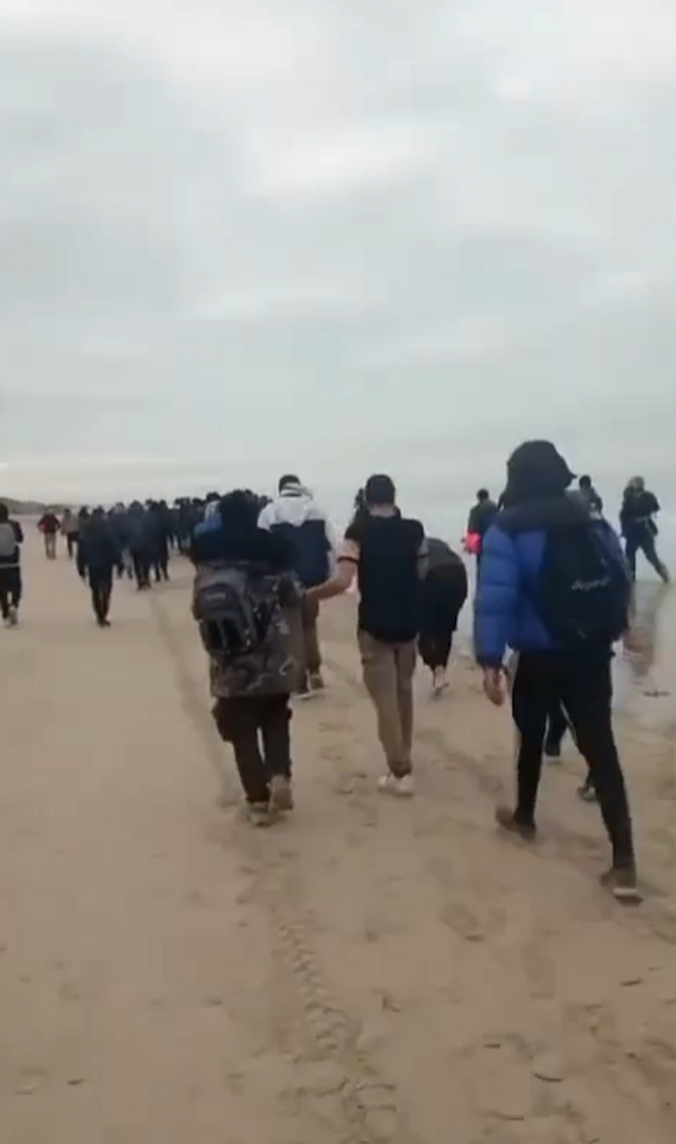 People arriving on the beach