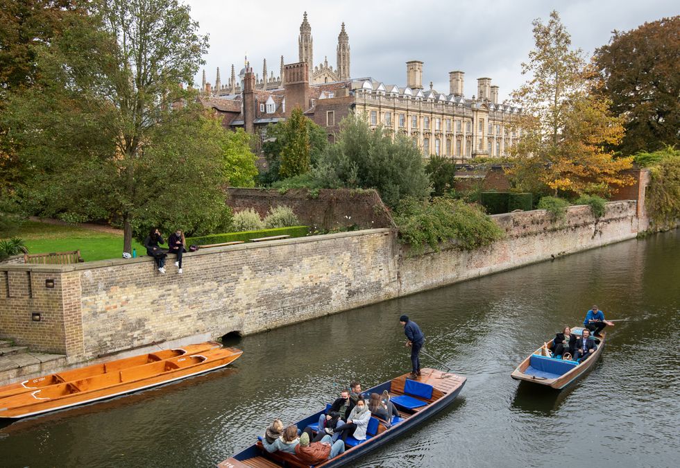 People enjoy a punt trip along the River Cam in Cambridge, where 223 students resident in the University of Cambridge's Homerton Colleg