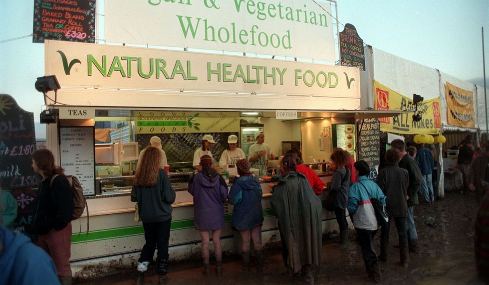 People queuing at a vegan food stand