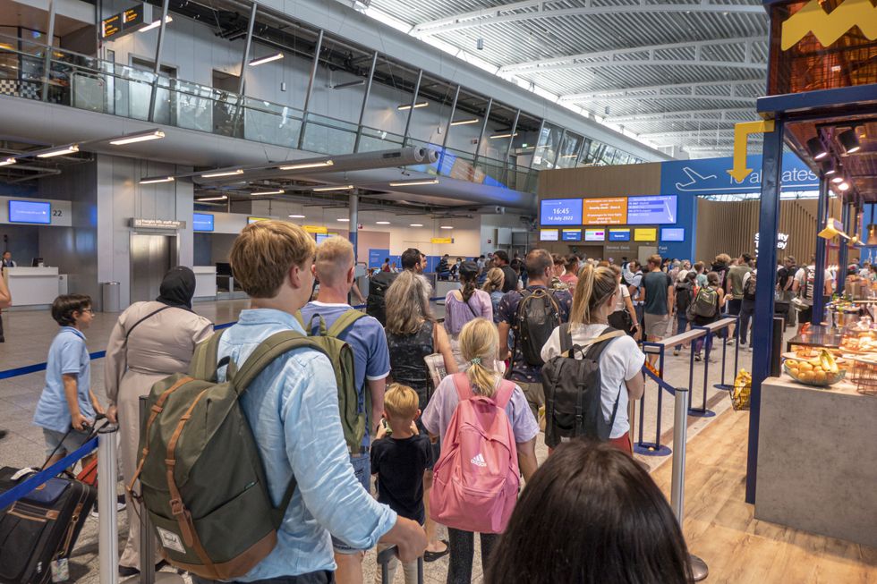 People queuing at gate