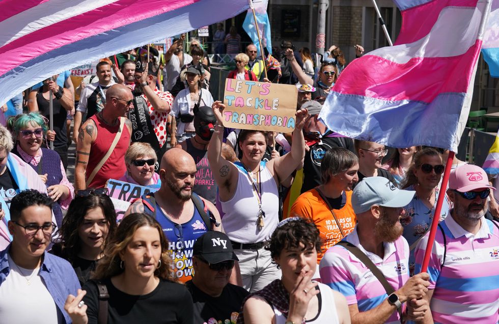 People take part in a Trans Pride protest march in Brighton on Saturday July 15, 2023.