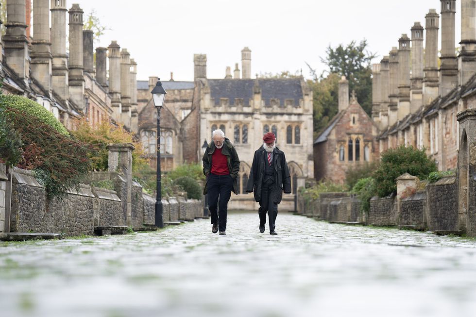 People walk along Vicars Close in Wells, Somerset. Picture date: Monday November 7, 2022.