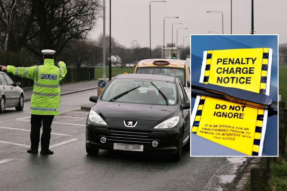 Police officer conducting traffic and a penalty charge notice